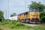 An eastbound freight begins to pull out of the yard
